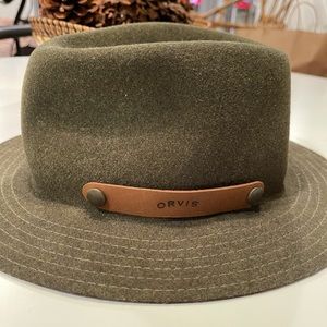 Dark green wool Orvis hat .